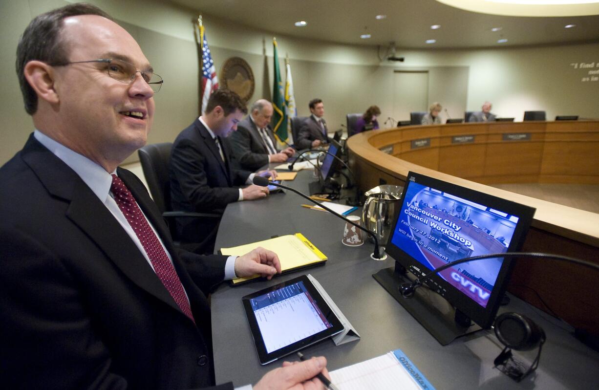 Vancouver City Councilor Jack Burkman, left, shown at a previous city council meeting.