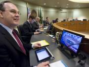 Vancouver City Councilor Jack Burkman, left, shown at a previous city council meeting.