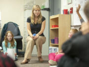 Yulia Rogers, a new fifth-grade teacher teacher at Endeavour Elementary gets to know her students on the first day of school in Vancouver Wednesday September 2, 2015.