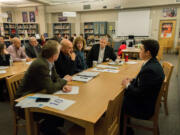 Cameron Vega, Camas High School DECA chapter president,  presents his public relations campaign to business and community members including Bracy Ratcliff, Crawford Tuttle, Mark Klein and Dana Coates.