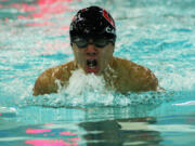 John Utas charges through the water in the 100-meter breaststroke.