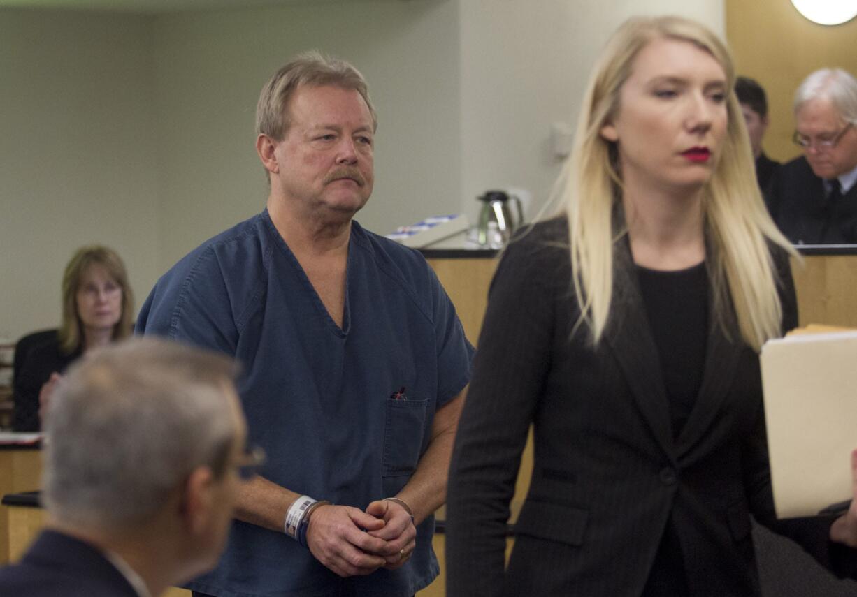 Camas High School custodian and assistant softball coach Robbyn D. Mattson makes a first appearance in Clark County Superior Court Dec.