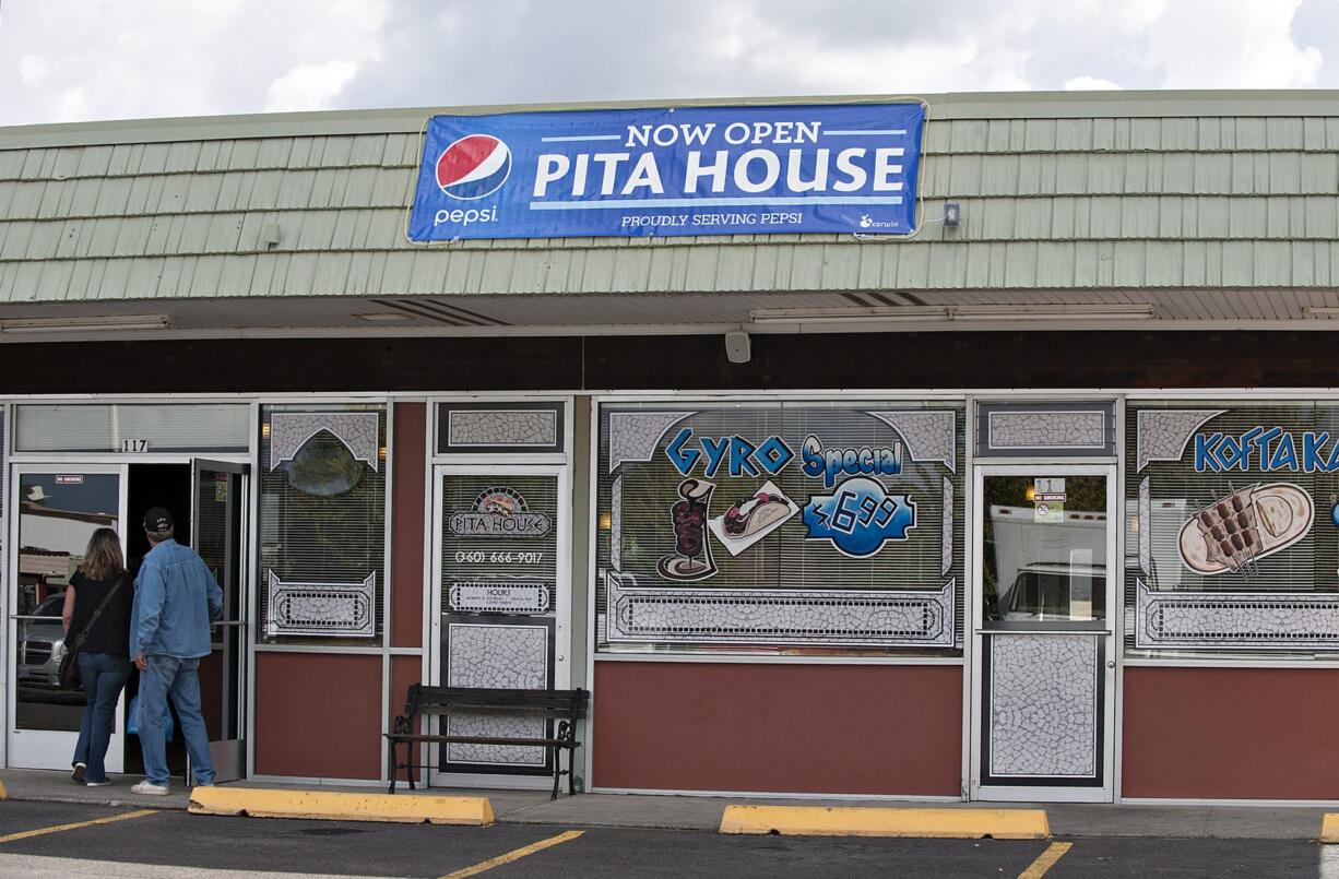 Customers enter the Pita House in Battle Ground for lunch.