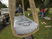 A headstone for Alexander Stuber, who died in 1908, is installed Jan. 31 in Camas Cemetery.