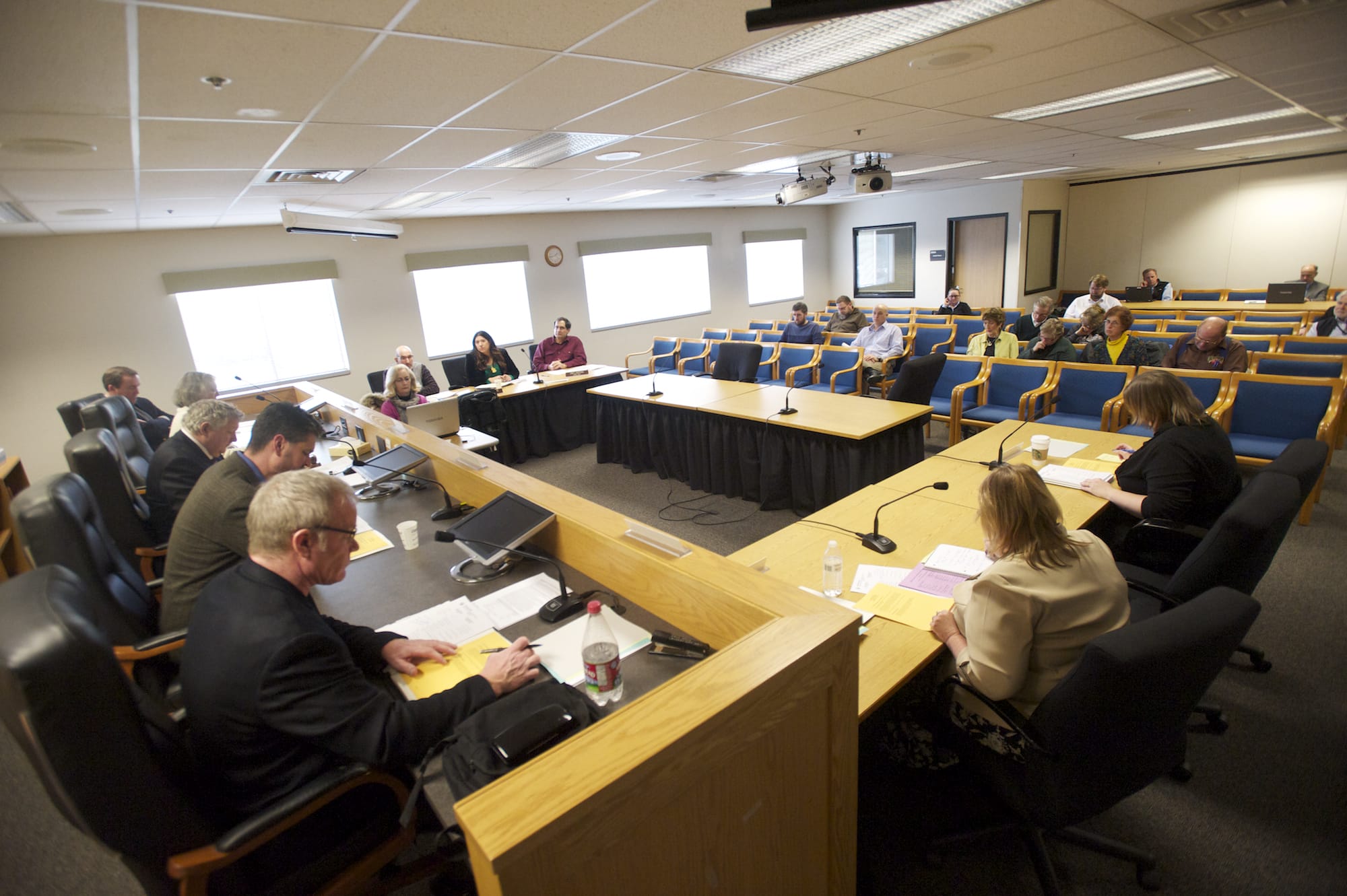 A group of Clark County residents attend an Energy Facility Site Evaluation Council board meeting Jan. 21. EFSEC is the state board that will forward a recommendation to the governor on whether or not to permit the Tesoro-Savage oil terminal at the Port of Vancouver.