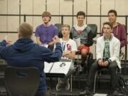 Ridgefield High School students practice the Foreigner song  &quot;I Wanna Know What Love Is&quot; while lead by teacher Bob Meek Tuesday morning, Sept. 2, 2015. Students are (front row from left) Logan Summers, 16, Michael Null, 15, (back row from left) Robert Sivewright, 17, Jacob Neil and Dominic Bright, 16.