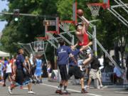 Photos by Steve Dipaola for the Columbian
The Hoops on the River three-on-three basketball tournament returned to Vancouver on Saturday with games on the streets around Esther Short Park.