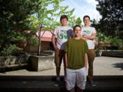 Triplets, from left, Ben, Joe and Sam Howard, all 18, will graduate from Mountain View High School June 12.