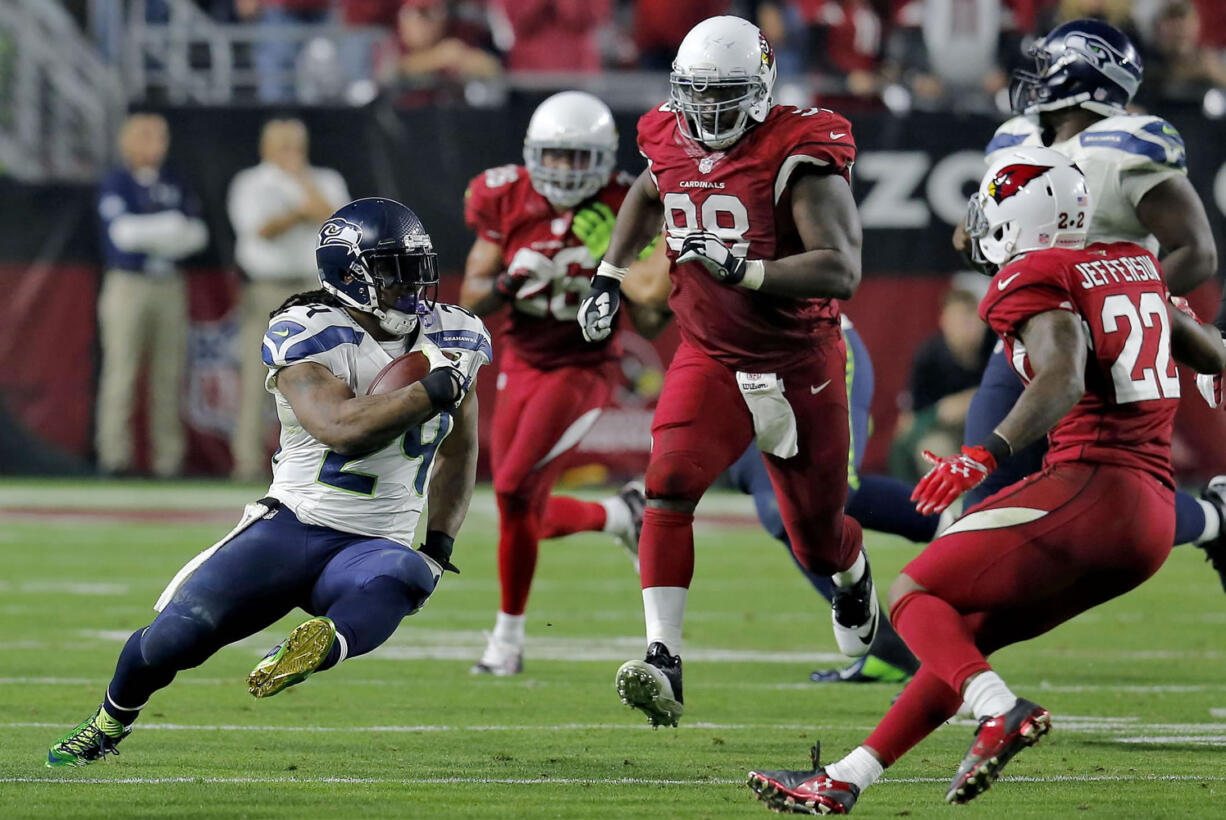 Seattle Seahawks running back Marshawn Lynch (24) cuts back during his 79-yard touchdown run against the Arizona Cardinals during the fourth quarter Sunday, Dec.