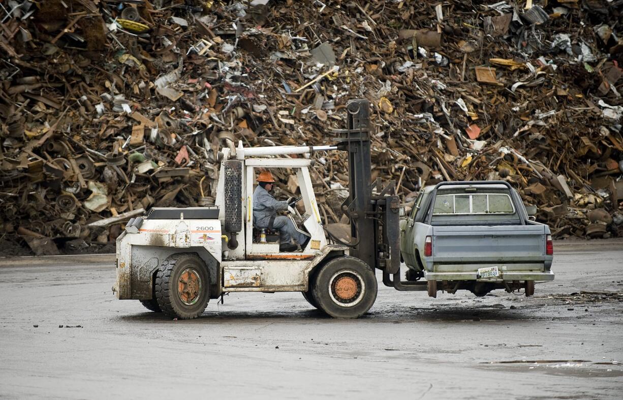 An old truck is prepped for shredding at Pacific Coast Shredding in 2011.