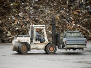 An old truck is prepped for shredding at Pacific Coast Shredding in 2011.