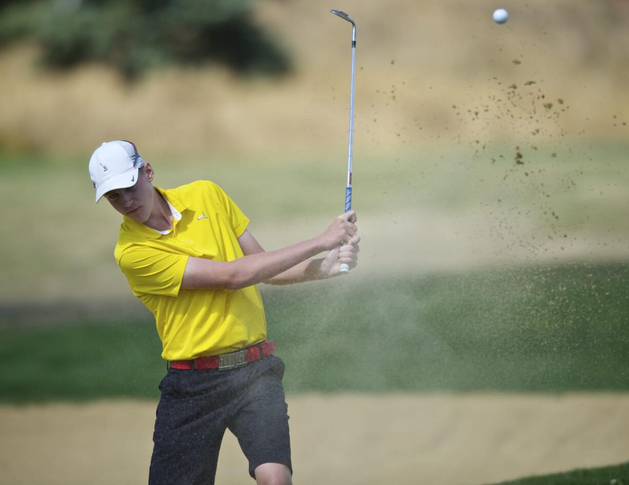 Fort Vancouver's Spencer Tibbits, hitting out of a bunker on No.