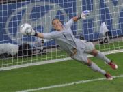 United States goalkeeper Hope Solo deflects a penalty shot during the quarterfinal match between Brazil and the United States at the WomenIs Soccer World Cup in Dresden, Germany, Sunday, July 10, 2011.