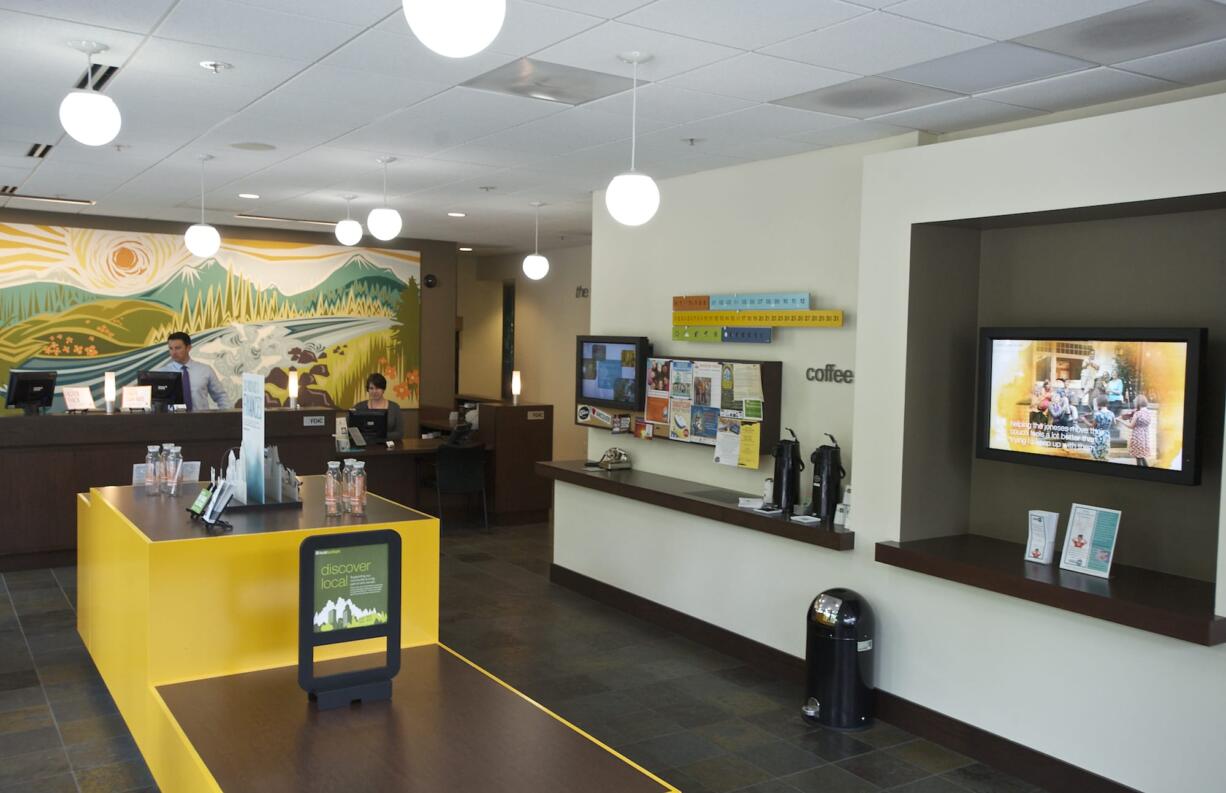 Portland-based Umpqua Bank has created customer-friendly &quot;stores,&quot; including this one at 720 Esther St. in Vancouver, as part of its branding as the &quot;world's friendliest bank.&quot;  Umpqua will become a larger presence in Clark County with its acquistion of Spokane-based Sterling Bank for $2 billion.