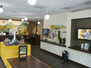 Portland-based Umpqua Bank has created customer-friendly &quot;stores,&quot; including this one at 720 Esther St. in Vancouver, as part of its branding as the &quot;world's friendliest bank.&quot;  Umpqua will become a larger presence in Clark County with its acquistion of Spokane-based Sterling Bank for $2 billion.