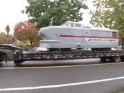 Two of the Oregon Zoo???s historic train cars returned to the zoo on Thursday following repairs and refurbishing over the summer by Pacific Power Group in Ridgefield.