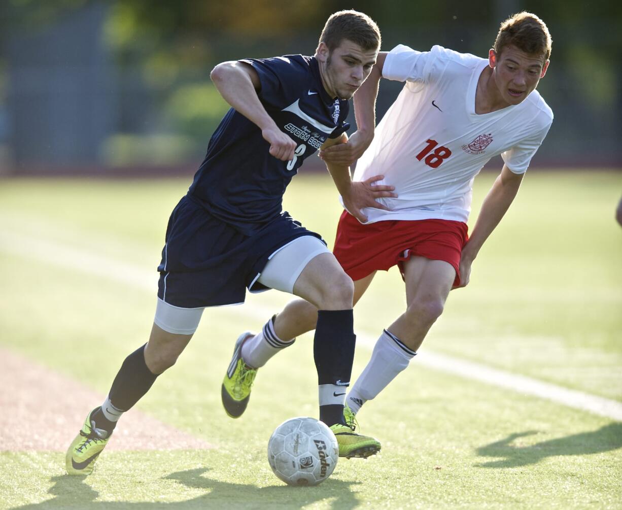 Skyview's Austin Horner, left, battles with Terry Cox of Ferris during the first half of Friday's 3A state semifinal.