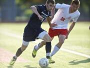 Skyview's Austin Horner, left, battles with Terry Cox of Ferris during the first half of Friday's 3A state semifinal.