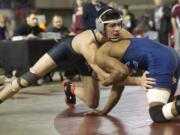 Union's Junior Godinho takes down Elijah Kilborn from Central Valley at 132 pounds.