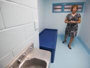 Clark County Jail Commander Kimberly Beltran gives a tour of an improved A-Pod, the jail's refurbished anti-suicide area.