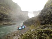 Rafters prepare to embark  down the White Salmon River from below the Condit Dam in March 2011 near White Salmon. The dam was blown out in October of that year and removed over the following months, and a long-term plan for the restored river's conservation is now under discussion.