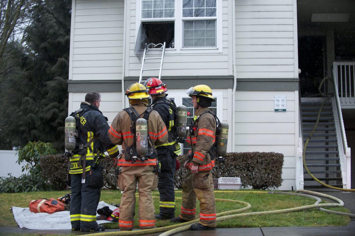 Firefighters respond to a fire at the Park Crest Commons apartment complex. A man was rescued out of his second-story bedroom window and treated at a local hospital for smoke inhalation.