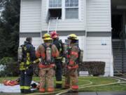 Firefighters respond to a fire at the Park Crest Commons apartment complex. A man was rescued out of his second-story bedroom window and treated at a local hospital for smoke inhalation.