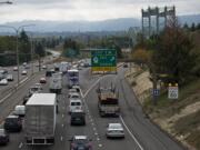 Southbound Interstate 5 traffic comes to a crawl as it approaches the Interstate 5 Bridge early Friday afternoon. Rainy weather created hazardous conditions for drivers, which led to a number of accidents in the area, including a five-car crash on the I-5 Bridge around noon.