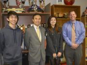 Washougal: Student Mitchell Myers, visiting Japanese Consul General Hiroshi Furusawa, student Tess Russell and Washougal High School Principal Aaron Hansen.