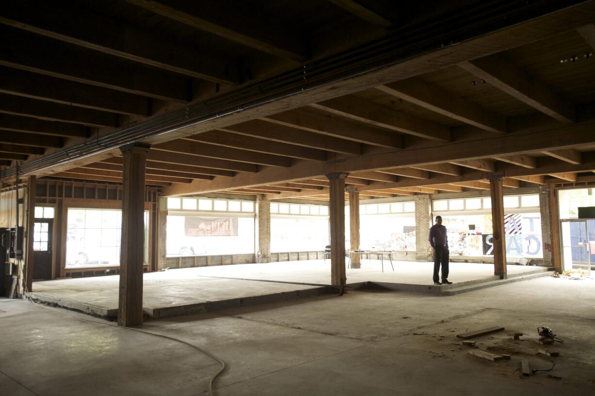 PHotos by Steven Lane/The Columbian
The unleased ground floor of Gravitate Design is undergoing preliminary construction work to accommodate a restaurant and office space. The digital marketing agency purchased the former Koplan's Home Furnishings building in December 2011.