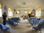 Robert Carlberg photographs the interior of Venersborg Church.