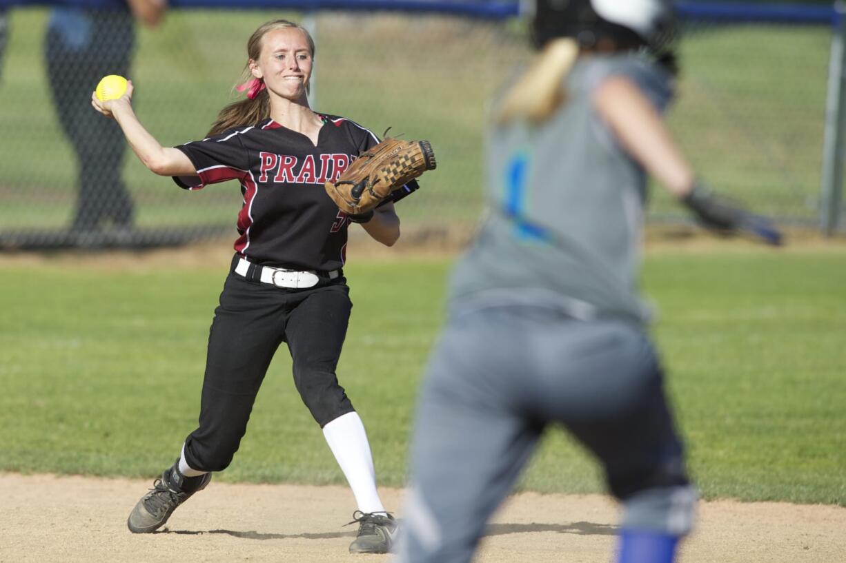 Prairie shortstop Nicole O'Haver throws out a base runner at second during the 2014 Senior All-Star Game at Clark College, Wednesday, June 4, 2014.