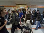 Hundreds of students fill the halls at Battle Ground High School on their way back to class after lunch on May 6.