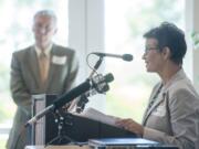 FTA Administrator Therese McMillan speaks as C-Tran CEO Jeff Hamm listens in the background, at an event at Clark College in Vancouver, Thursday September 10, 2015. McMillan officially announced a $38.5 million grant award for C-Tran's bus rapid transit project known as The Vine.