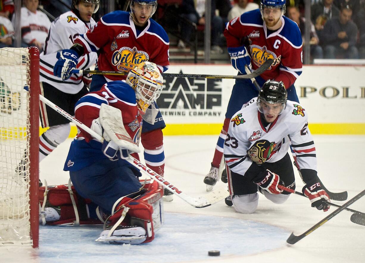 The Winterhawks' Dominic Turgeon watches the puck go wide across the crease against the Oil Kings in the second period of Game 5 Friday.