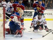 The Winterhawks' Dominic Turgeon watches the puck go wide across the crease against the Oil Kings in the second period of Game 5 Friday.