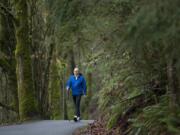 Warren Nelson nordic walks along the Burnt Bridge Creek Trail,in February 2010.