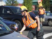 On Thursday, Vancouver firefighter Kevin Hart was among a group of off-duty fire service employees soliciting donations at Northeast Highway 99 and Northeast 78th Street.