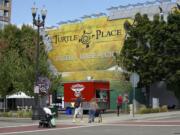 Food trucks, including Esoteric BBQ, have set up in Turtle Place plaza this summer as part of a pilot program to revitalize the underused public space.