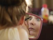 A model prepares for the Couve Couture Spring Fashion Show at the Red Lion at the Quay on Saturday.