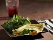 The Frenchie, a savory crepe, pairs with house-made blackcurrant soda at C'est La Vie in downtown Battle Ground.