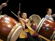 Photos by Steven Lane/The Columbian
Portland Taiko Drum Group performs at the 10th annual Clark College Sakura Festival on Thursday.