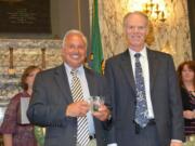 Harney Heights: Bill Allman, left, receives the an award from VA administrator Mike Murphy in Olympia.