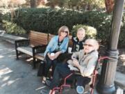 The family of the late Donald Jarosek -- from left, daughter Diane Sanders, grandson Crue Sanders, 5, and widow Vivian Jarosek -- gather at Esther Short Park in Vancouver on Sunday.