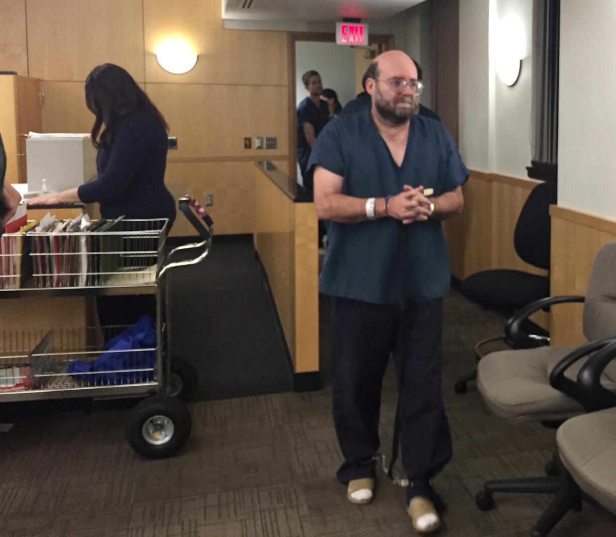 Boy Scouts leader and former substitute teacher Darrel Dwight enters a Clark County courtroom Monday to hear release conditions related to his child pornography case.