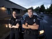 New Vancouver Police officer Katie Endresen, left, and  her field training officer, Tom Topaum.