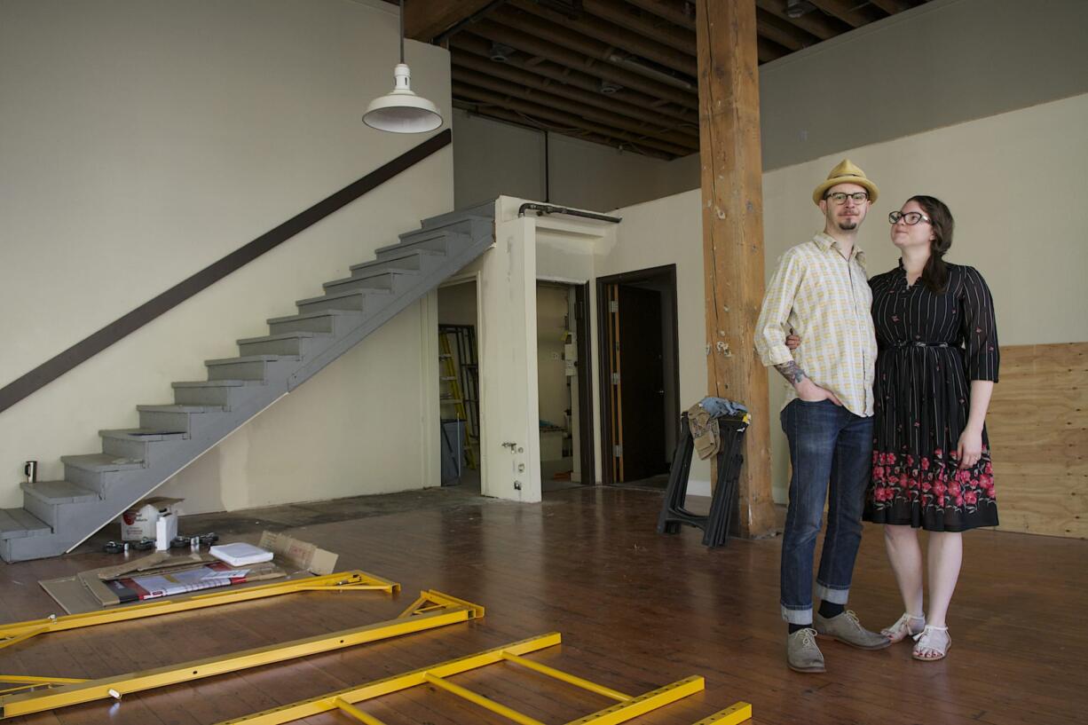 Chris &quot;Salty&quot; Reed, left, and his wife Cindy Reed hope to open their future restaurant business, Grocery Cocktail and Social, in August at the corner of Seventh and Washington streets in downtown Vancouver.