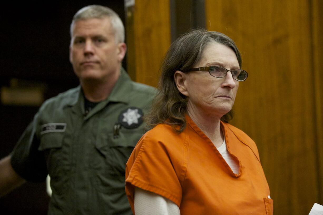 Gayle Bethke enters the courtroom of Clark County Superior Court Judge Barbara Johnson where she pleaded guilty to the 2012 attempted murder of her husband, Roger Bethke.