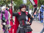 Kait Baird, 16, of Portland wields the scythe she made for her Ruby Rose costume. The character is from the American animated web series RWBY.