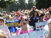 Yesenia Elizarraraz, 9, a student at Mill Plain Elementary School, celebrates her Mexican heritage in the 12th annual Children's Cultural Parade at the Fort Vancouver National Historic Site.